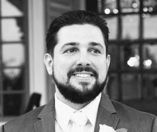 a man wearing a suit and tie